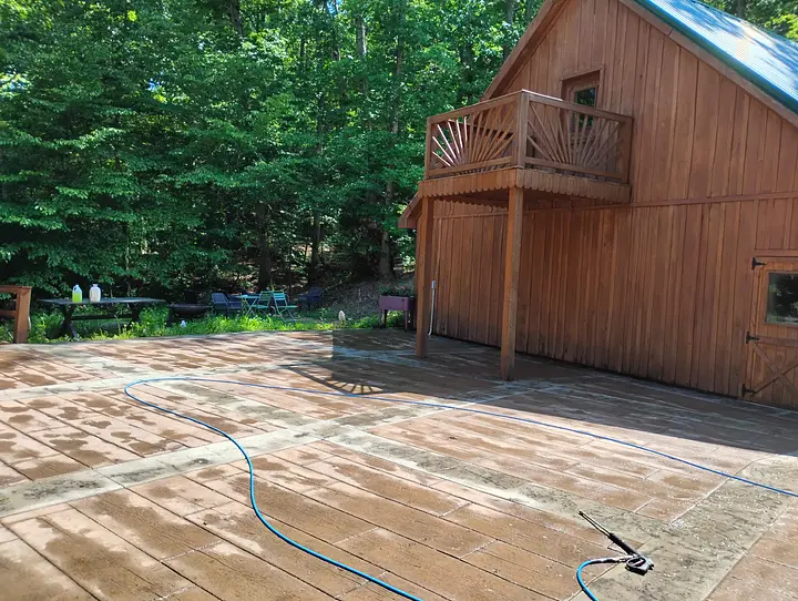 Mud and mildew removal on beautiful stamped concrete patio.
